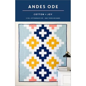 May include: A quilt pattern called "Andes Ode" by Cotton + Joy. The quilt features a geometric design with blue, white, yellow, and pink squares.