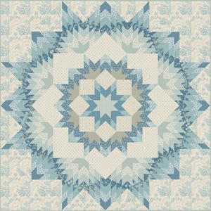 May include: A large, square quilt with a central starburst design in shades of blue and cream. The star is surrounded by geometric patterns and floral accents. The quilt's edges feature a repeating floral pattern, creating a cohesive and decorative textile.