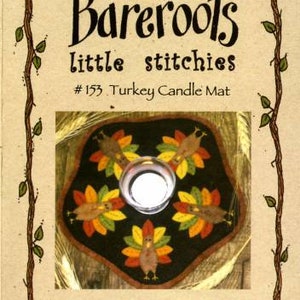 May include: A needlepoint candle mat with a turkey design. The mat is brown with orange, yellow, and green accents. The text "#153 Turkey Candle Mat" is printed on the image. The text "Bareroots little stitches" is printed above the candle mat.