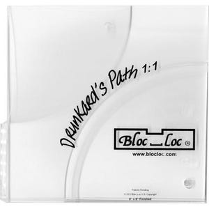 May include: A clear plastic template for quilting, called "Dreamkared's Path 1:1". The template is designed for use with a Bloc-Loc quilting system. The template is 8 inches by 8 inches.