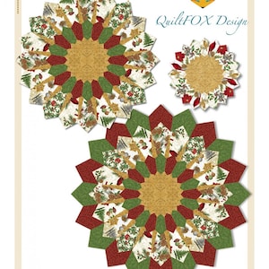 May include: A Christmas table topper and placemat set with a red, green, and gold snowflake design. The table topper is 40 inches and 50 inches in diameter. The placemat is 18 1/2 inches in diameter.  Quilt FOX Design. Copyright Judit Hajdu 2021.