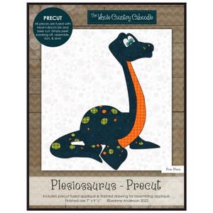 May include: Precut applique pattern for a cartoon plesiosaurus with a blue body, orange neck, and green spots. The pattern includes instructions for assembling the applique. Finished size is 7 inches by 9 1/4 inches.