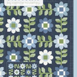 May include: A quilt pattern titled "Thimble Blossoms" by Camille Roskelley. The design features a repeating floral pattern in shades of blue, green, and white on a navy background. The quilt is labeled "Edelweiss" and is a 74-inch flower quilt.