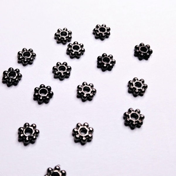 Gunmetal Daisy Spacers 4.5 x 1.5 mm, 1 mm Hole