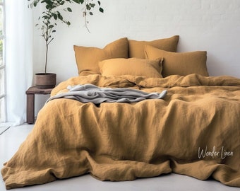 Linen bedding set in mustard. King or Queen size duvet cover with button closure and 2 envelope pillow cases