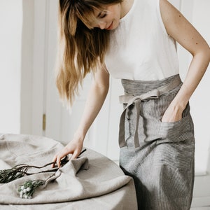 Linen apron for women. Natural gray stripes linen half apron with pockets. Striped unisex soft linen apron. Handmade midi cafe apron
