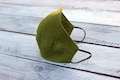 Linen face mask. Moss green fabric reusable mask. Stonewashed soft anti dust mask. Face protecting cover. Natural linen breathable mask product logo
