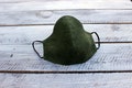 Linen face mask. Green fabric reusable mask. Stonewashed soft anti dust mask. Green face protecting cover. Natural linen breathable mask product logo