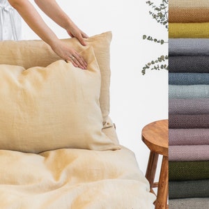 Linen pillowcase with envelope closure in chamomile color. Sand beige washed soft linen king bedding. Decorative stonewashed queen pillow