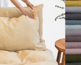 Linen pillowcase with envelope closure in chamomile color. Sand beige washed soft linen king bedding. Decorative stonewashed queen pillow