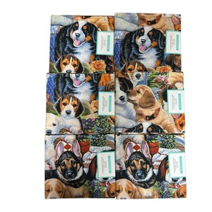 May include: A stack of fabric squares featuring various dog breeds, including Bernese Mountain Dogs, Beagles, and German Shepherds. The fabric has a colorful, detailed print with floral and garden elements. Each square has a tag attached.