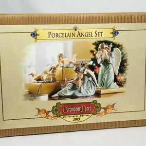 NEW GRANDEUR NOEL 2003 Porcelain Angels Cherubs Christmas 4 Piece Set 8-1/2”