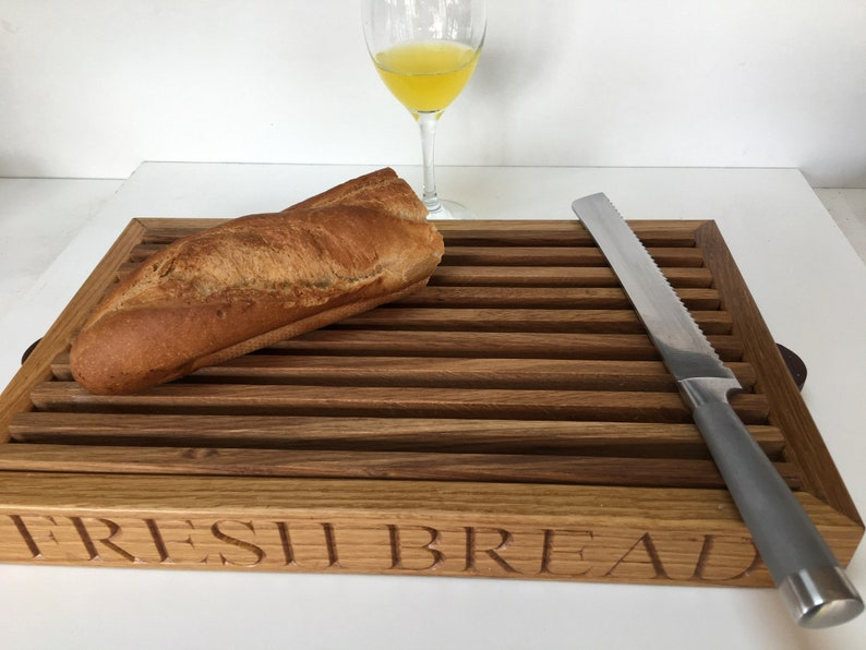 Bread cutting board, Crumb catcher style, Available in many woods, Oak, Beech cherry or Walnut. Customisable bread cutting board. image 1