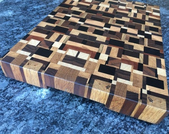 End Grain Chaos Pattern cutting board made from a mix of hardwoods including Ash, Oak, Cherry,Walnut, Sapele, Maple, Wenge, Mahogany