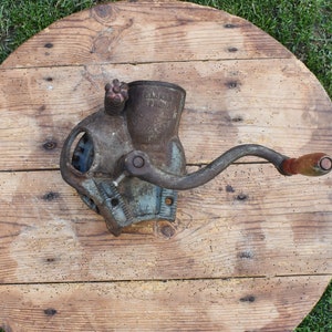 Antique agricultural implement for pounding corn,  Maize grinder, Corn cob grinder, Vintage corn cultivator, Hand crank for corn cob