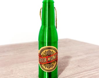 Adorno navideño con forma de botella de cerveza y dinero para cerveza