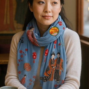 The Scarf Pashmina is a semi-sheer, lightweight, elegant blue wrap with a Japanese-inspired design