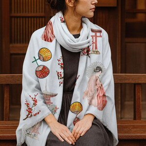 Chic Scarf is a lightweight, semi-sheer blue pashmina, designed as an elegant Japanese Geisha-style shawl