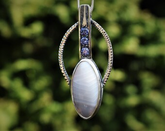 Handmade Botswana Agate Pendant: Sterling Silver, Tanzanite & Zirconia