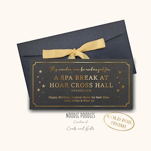 May include: A rectangular black gift voucher with gold foil lettering and star accents, featuring the text: This voucher can be exchanged for A SPA BREAK AT HOAR CROSS HALL 14TH JULY 2026 Happy Birthday Jessica! Have the best time. Love Abbie & Rose xx. Includes a black envelope with a gold ribbon.