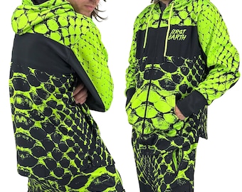 May include: A two-piece outfit featuring a neon green and black snake scale pattern. The jacket has a black panel across the chest with the text "FIRST EARTH". The matching pants also have the snake scale design. The outfit includes a hooded jacket and pants.