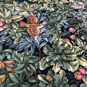 May include: A tapestry featuring a detailed design of a forest scene with birds, leaves, and berries. The tapestry is woven with a variety of colors, including green, brown, and red.
