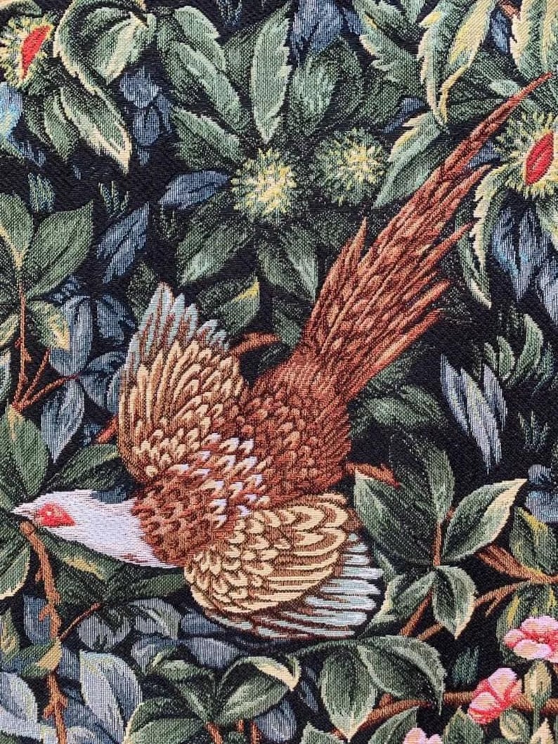 May include: A tapestry featuring a brown and white pheasant with a long tail, flying through a dark green and blue floral pattern.
