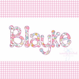 May include: A white background with a pink gingham border. The name "Blayke" is spelled out in large, pink outlined letters. The letters are filled with a floral pattern. The text "sweetly stitched" is in a smaller font at the bottom of the image.