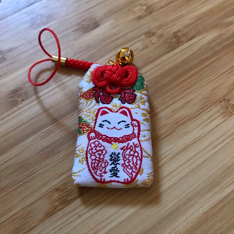 Glücksbringer Talisman Wahnsinn der Liebe Omamori Bild 1