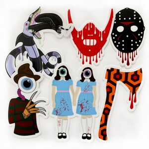 May include: Set of 10 horror movie themed stickers featuring characters like Freddy Krueger, Jason Voorhees, and the creature from the Black Lagoon. The stickers are printed on white vinyl and are waterproof and durable.