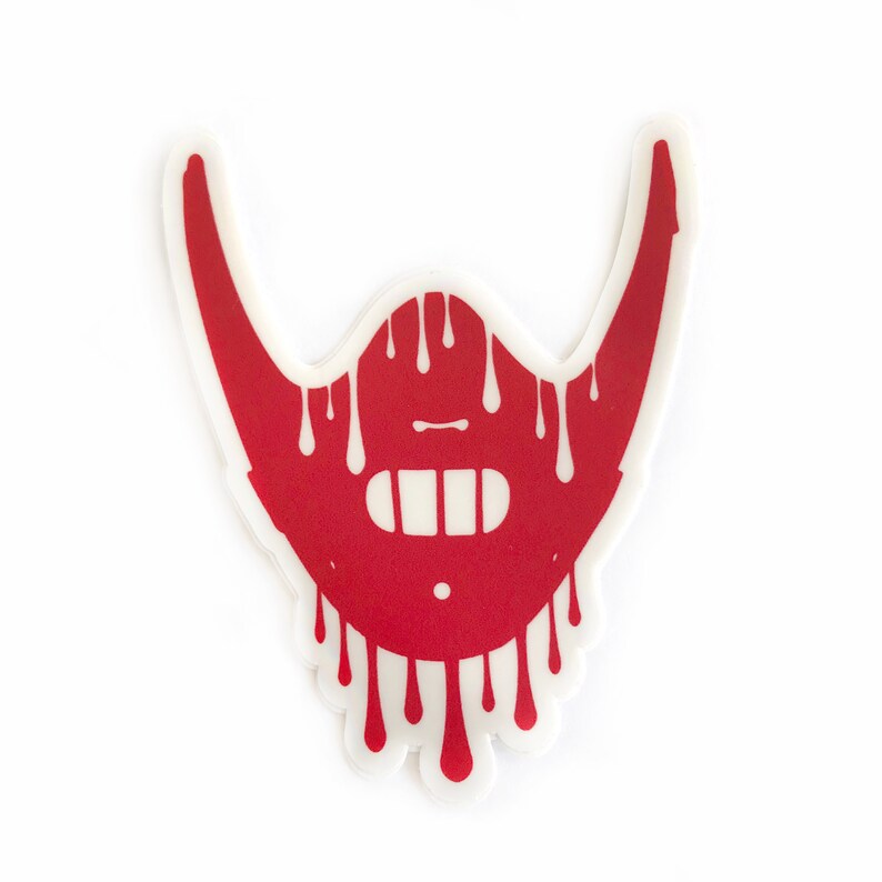 May include: Red sticker of a dripping beard with a mouth and teeth.