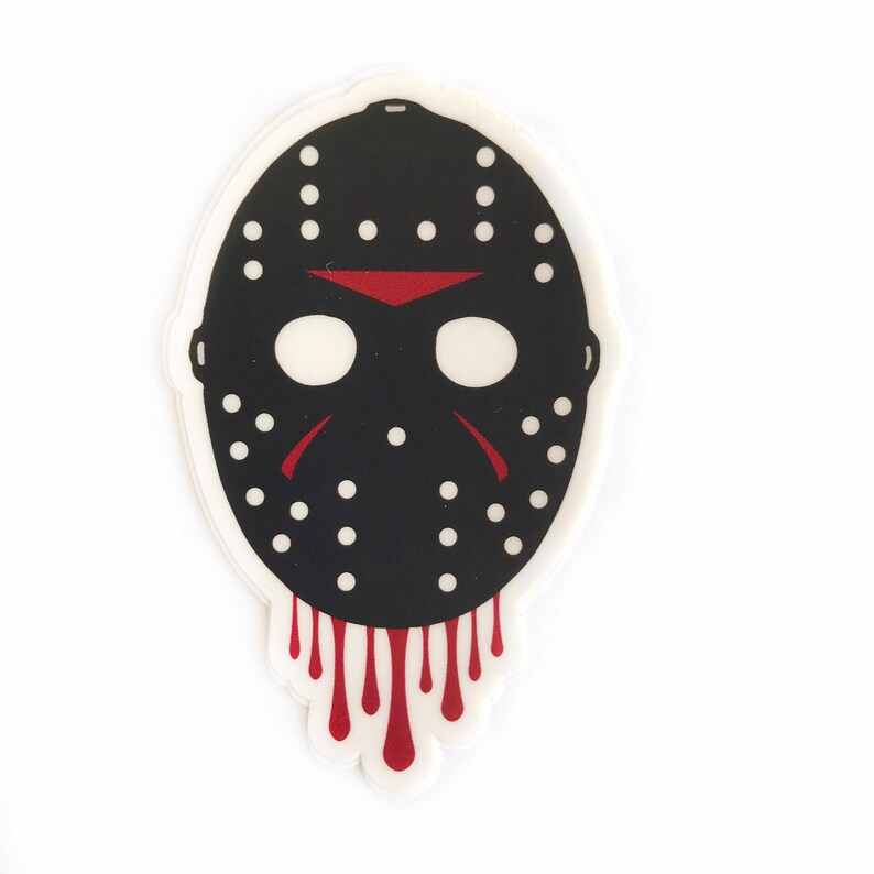 May include: A black and white hockey mask with red dripping blood. The mask has a white outline and a red triangle on the forehead.