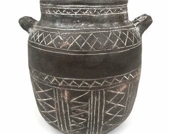 Ancient Greek amphora vase. Authentic Italian artwork. Artistic ceramic pottery. Nuragic Ancient civilization pottery. Vase reproduction