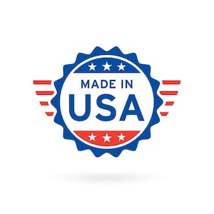 May include: A blue and red circular sticker with the text "Made in USA" and five white stars. The sticker has a white background and is surrounded by red and white stripes.