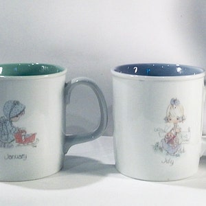 Your Choice - ENESCO PRECIOUS MOMENTS  Collectible ‘Month’ Coffee Hot Chocolate Tea Cup 1987 - Giftable