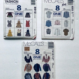 May include: Three sewing patterns for shirts and aprons. The patterns are from McCall's and feature the text "Great Looks One Easy Pattern".