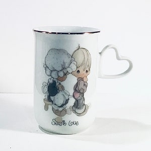 ENESCO PRECIOUS MOMENTS ‘Sew in Love’ Coffee Tea Cup with Heart Handle  1984 - Giftable