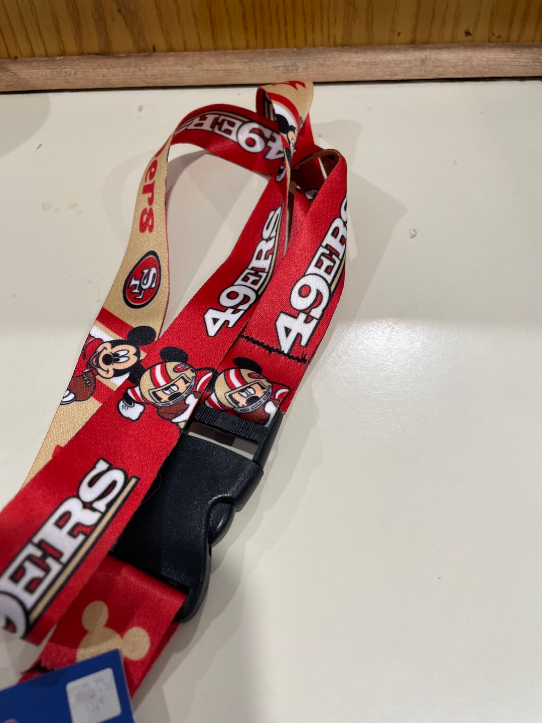 thumbnail image 2 of NFL San Francisco 49ers Lanyard – Jerry Rice – Officially Licensed – Team Colors, 23 X 1 Inch Key Ring ID Holder 2 of 6