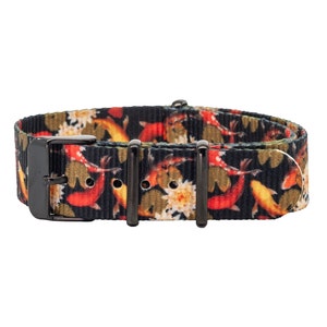 May include: Black watch strap with a colourful koi fish pattern. The strap has a black buckle and two black keeper loops.