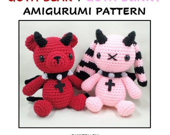 May include: A crochet pattern for making a goth bear and a goth bunny amigurumi. The bear is red with black horns and a silver studded collar with a cross. The bunny is pink with black and pink striped ears, black horns, and a silver studded collar with a cross. The pattern is by Kuebiko Krafts.