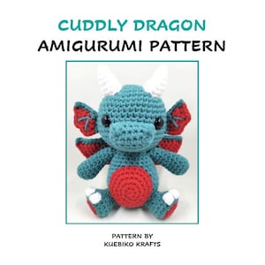 May include: A crochet amigurumi pattern for a cuddly teal dragon with red wings and white horns. The pattern is by Kuebiko Krafts.