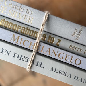 Gray and Gold Coffee Table Book Stack
