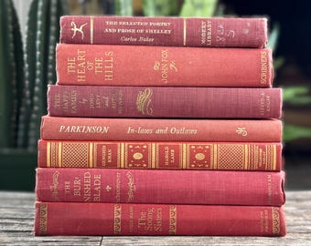 Vintage Coral, Cherry Red, and Gold Books for Display