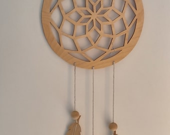 Birch wood dreamcatcher, cut with a scroll saw. Handmade creation.