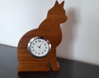 Cat silhouette clock, handcrafted wooden creation.