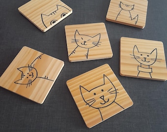 Wooden coasters, beer mats, cat and kitten designs. French handcrafted creation.