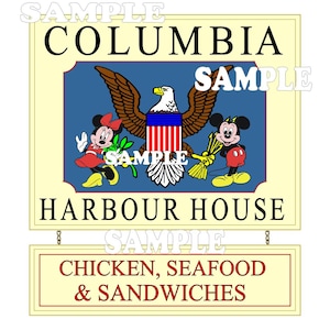 May include: A yellow sign with the text "Columbia Harbour House" and a blue background with a bald eagle, Mickey Mouse, and Minnie Mouse. The sign also says "Chicken, Seafood & Sandwiches".
