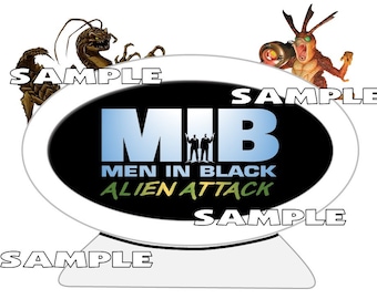 Universal Studios MIB Men in Black Alien Attack Ride Scrapbook Embellishment Paper Die Cut Piece