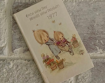 Vintage Betsey Clark pocket datebook | unused 1977 small white diary calendar by Hallmark for old 1970s memorabilia or junk journal supply