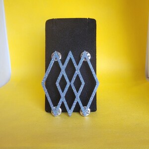 Triple Open Atomic Diamond Brooch in Silver Resin